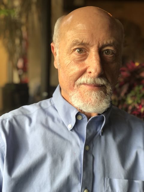 David Johnson in a light blue shirt in natural light